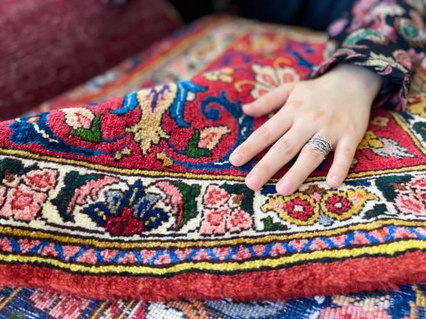 Hand Feeling a Rug | Seasonal Rugs